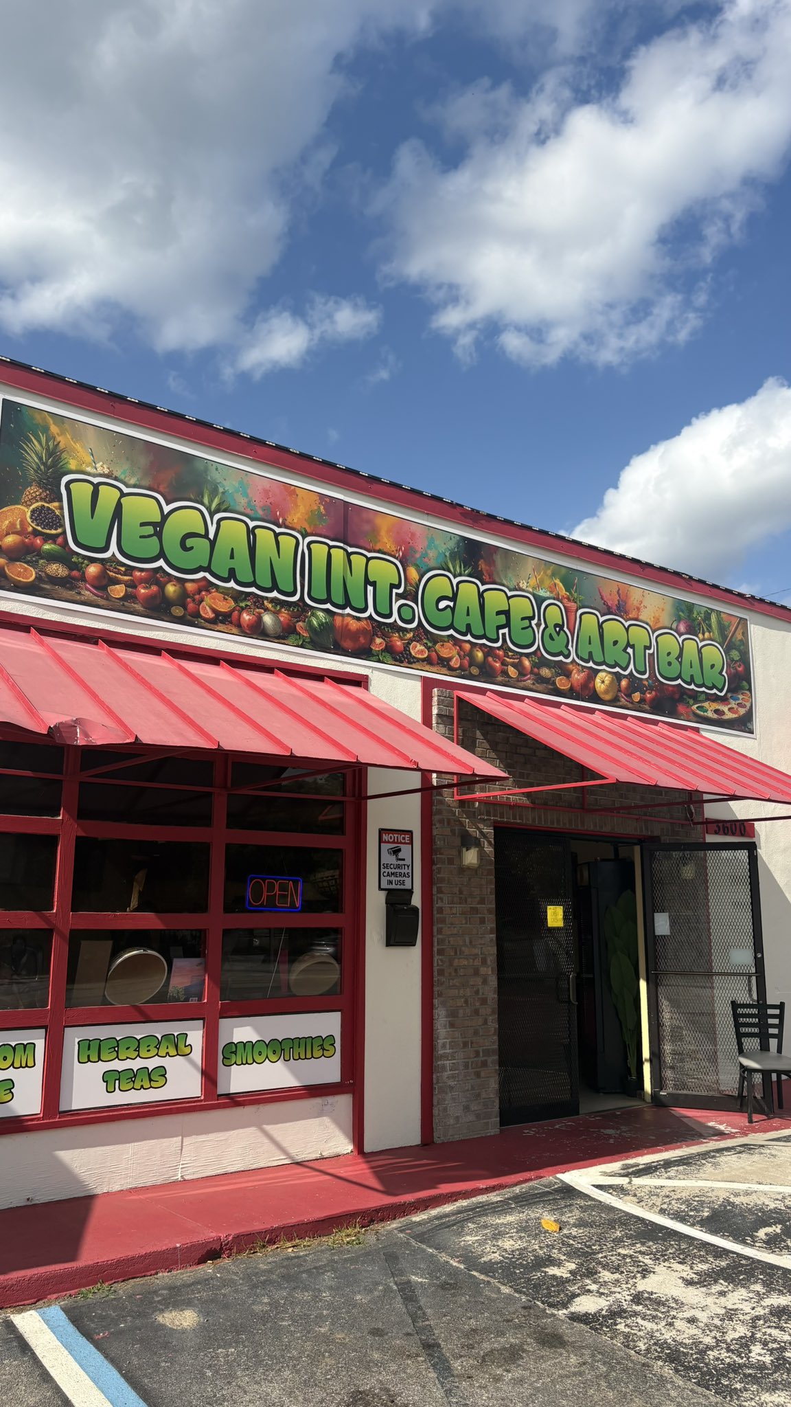 Vegan International Cafe & Art Bar storefront on River Drive in Columbia, SC